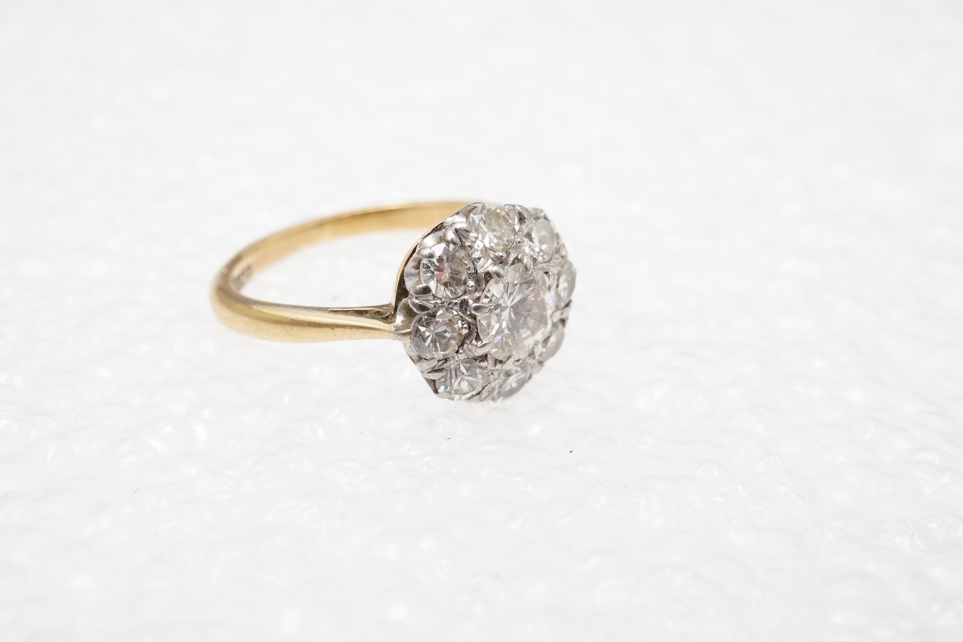 A diamond cluster ring